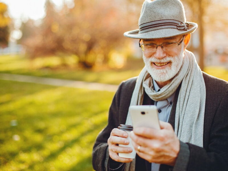 This image has an empty alt attribute; its file name is elegant-old-man-sunny-autumn-park-scaled.jpg