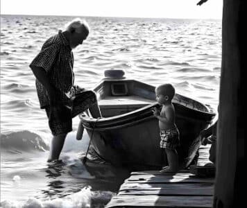 grandfather_grandson_getting_into_boat